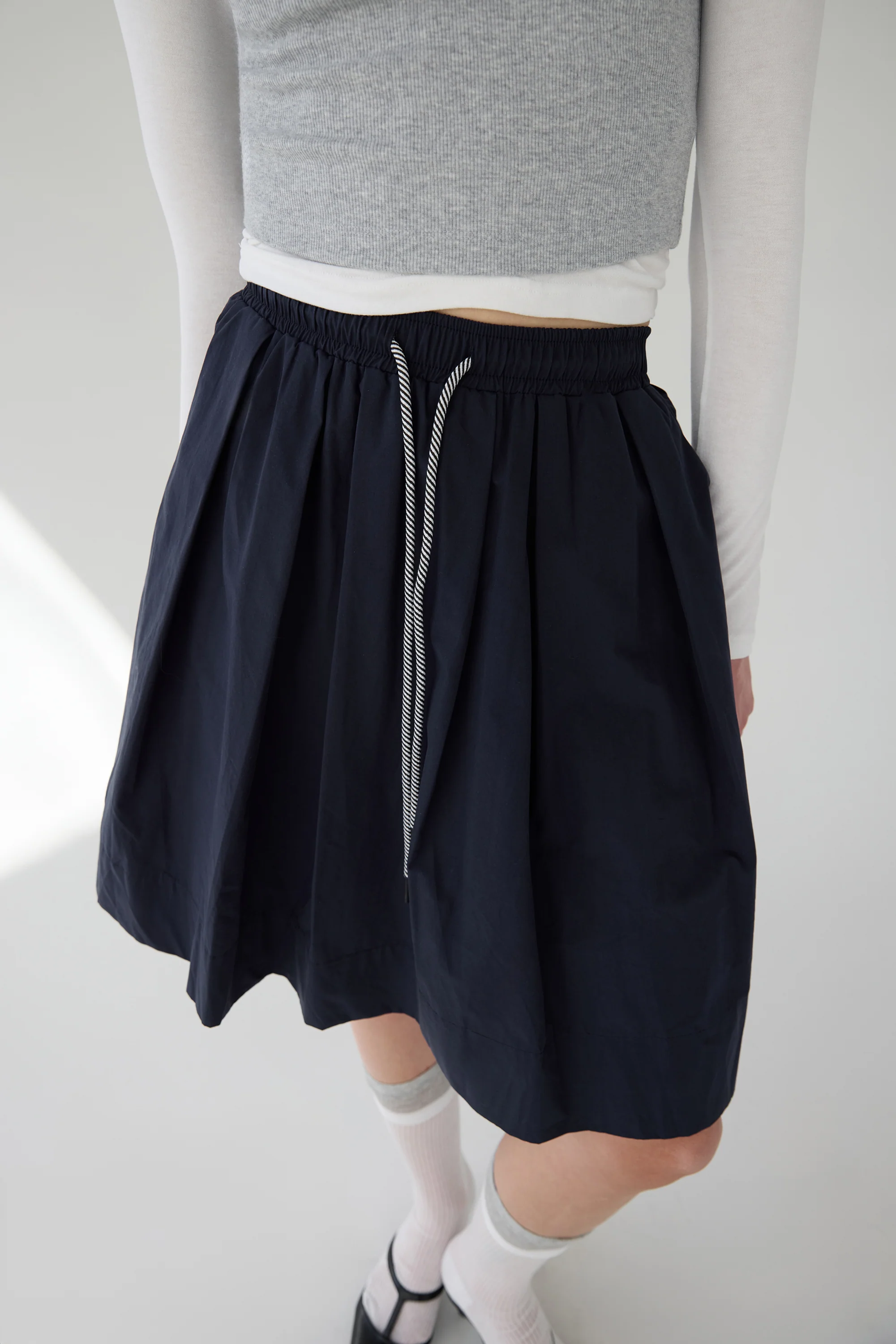 PLEATED DRAWSTRING MIDI SKIRT